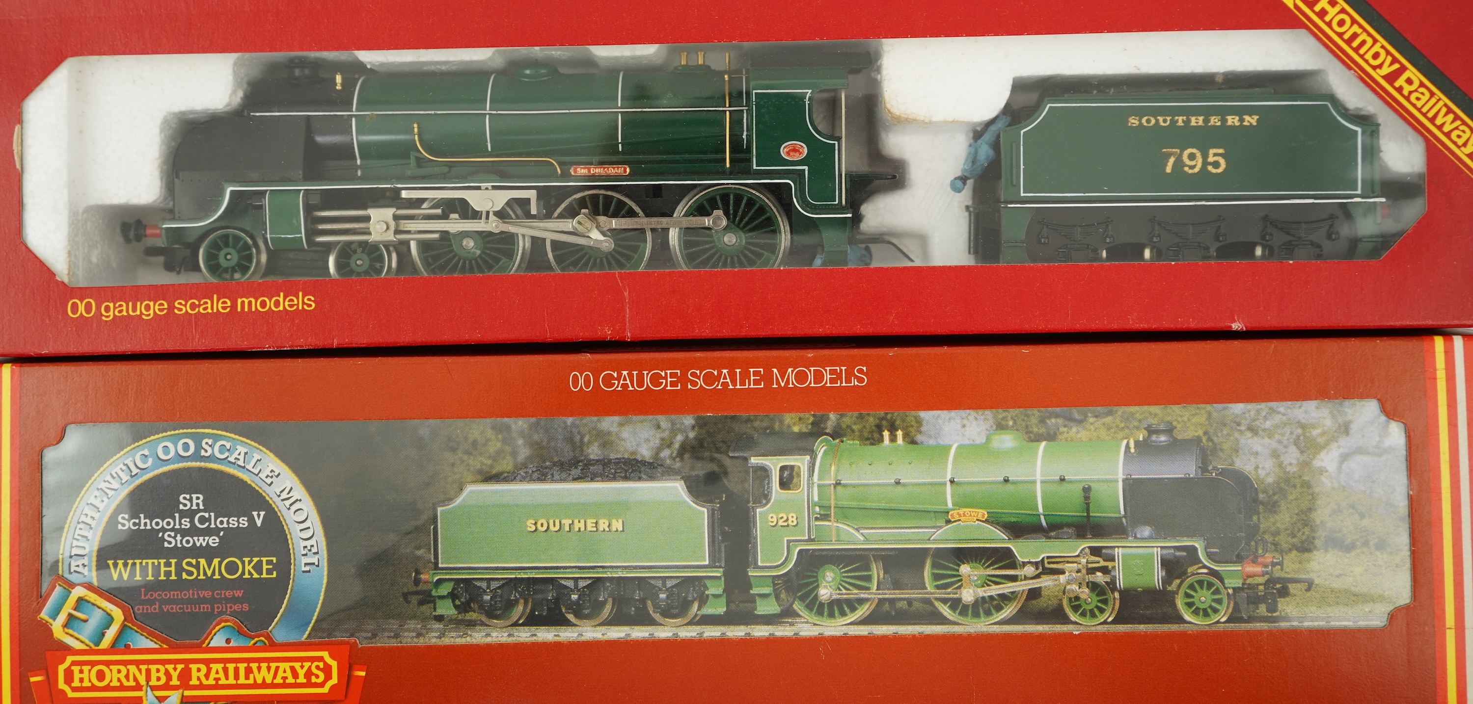Three boxed Hornby Railways 00 gauge Sputhern Railway tender locomotives; a Battle of Britain Class, Spitfire 21C166, (R374), a Schools Class, Stowe 928, (R380), and a Class N15, Sir Dinadan 795 (R154)